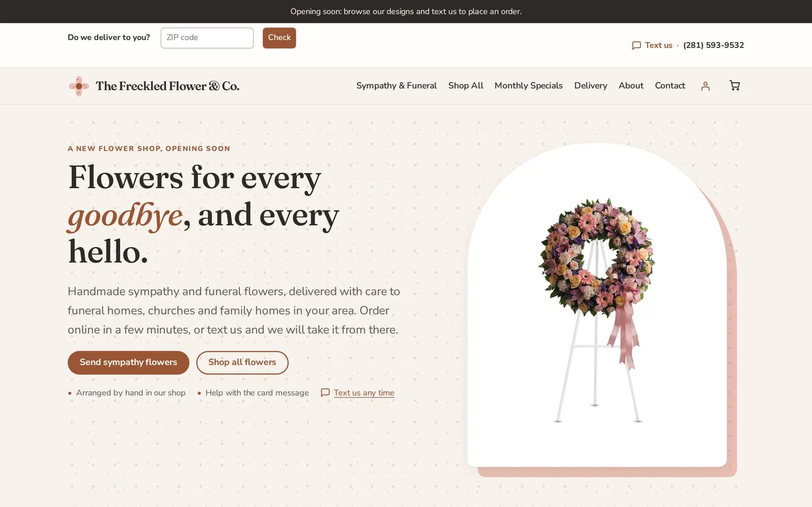 Home page of The Freckled Flower & Co. showing the headline 'Flowers for every goodbye, and every hello,' sympathy and shop buttons, and a pastel wreath on an easel